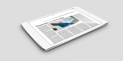 Tablett mit Zeitungsartikel von LiCON mit der Überschrift: Im Expresstempo zum digitalen Zwilling.