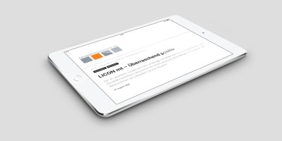 Tablet mit Zeitungsartikel von LiCON mit dem Titel LiCON mt: Überraschend positiv