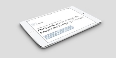 Tablett mit Zeitungsartikel von LiCON mit dem Titel: Plattformkonzept ermöglicht passgenaue Fertigungslösungen